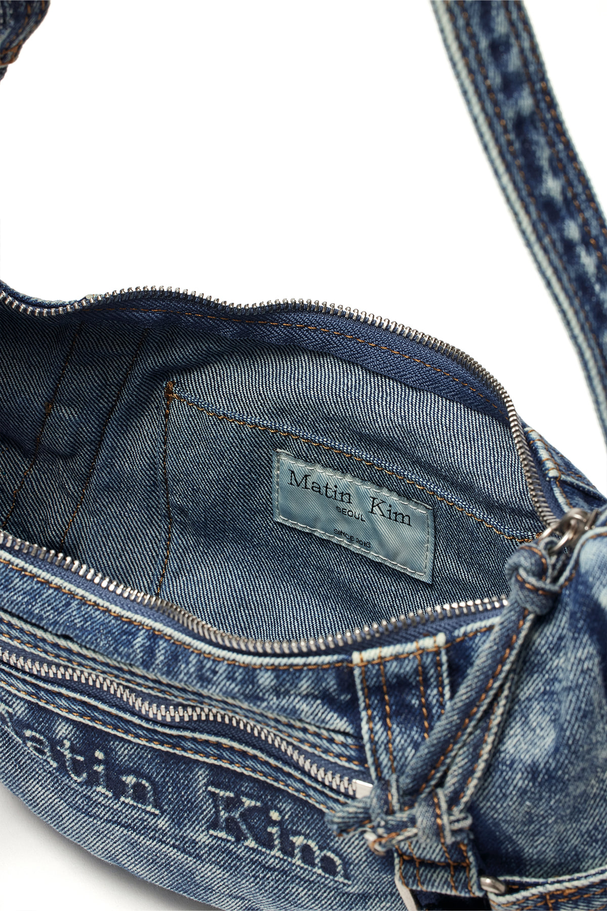 25SS人気 MATIN KIM MATIN WASHED DENIM MINI HOBO BAG 送料無料 MATIN KIM WASHED DENIM MINI HOBO BAG | WY Store